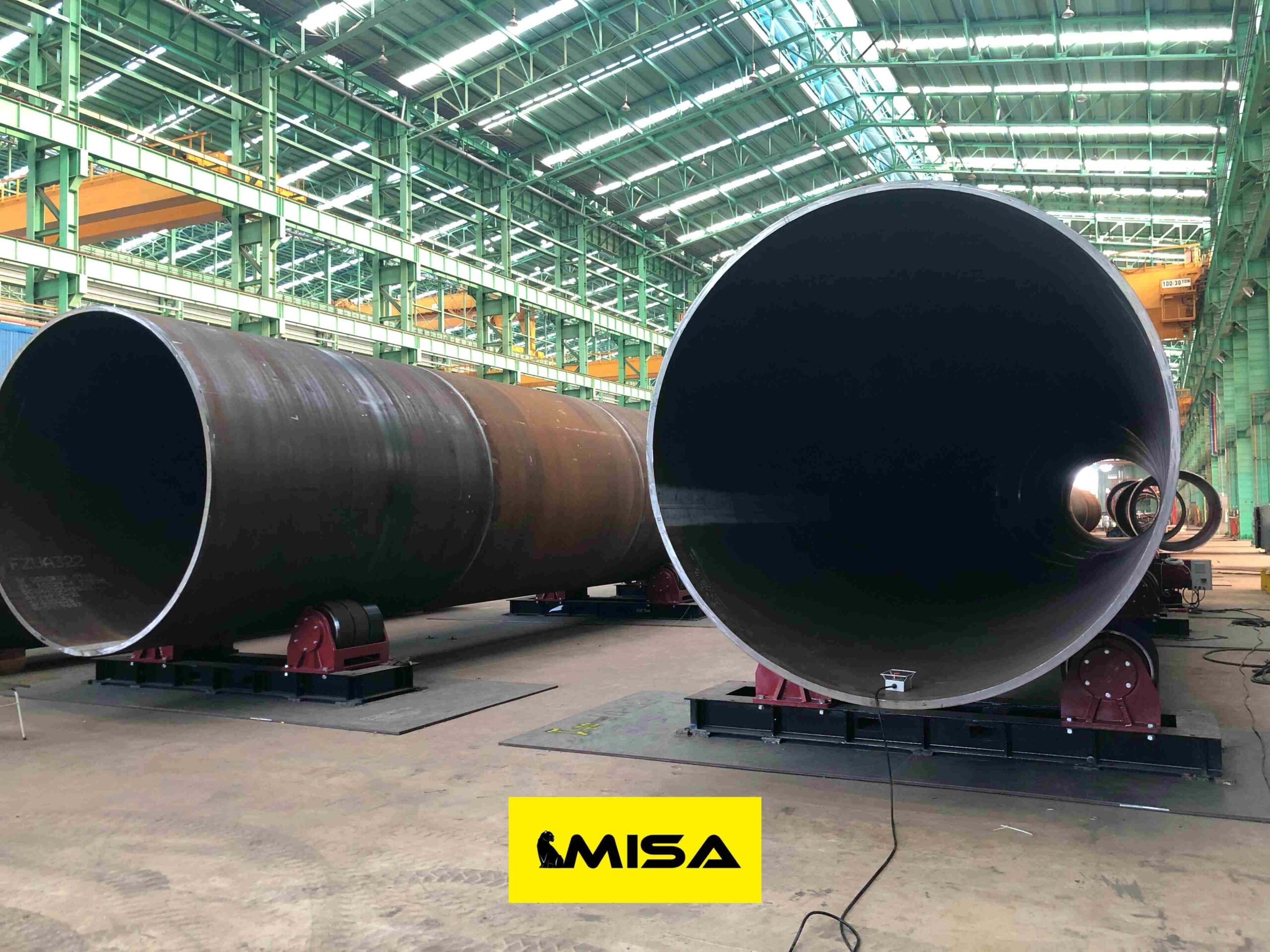 Automated vessel welding setup using rotators with operator access and support equipment